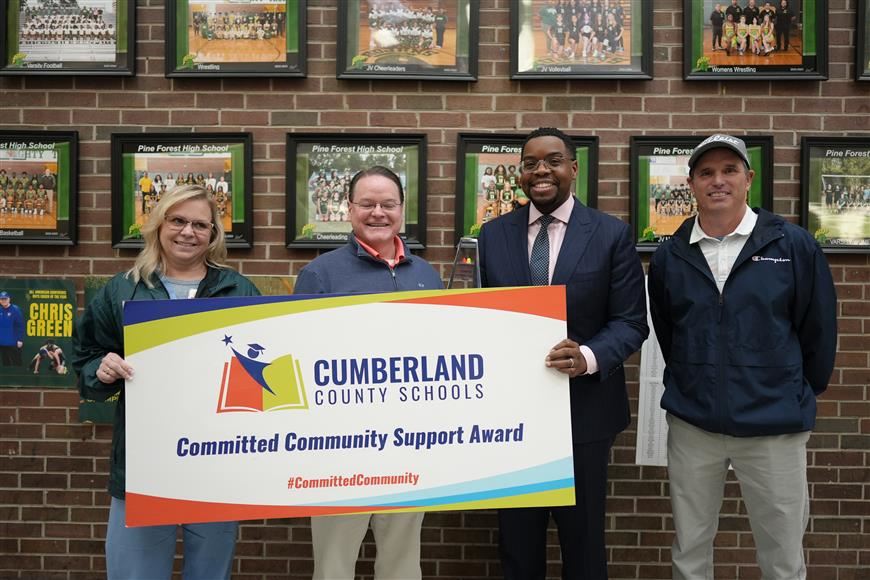 Feb. 2024 Committed Community Winner with Group